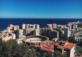 Bild von Malaga mit Meer und Stierkampfarena
